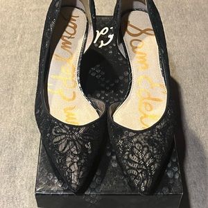 Black lace dress shoes, open side sliver on heel. Gently used.